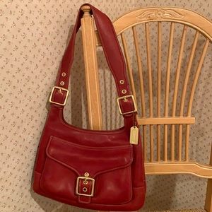 Coach Red Leather Legacy Saddle Bag.